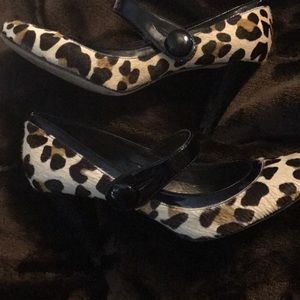 Hide- On leopard and patent pumps